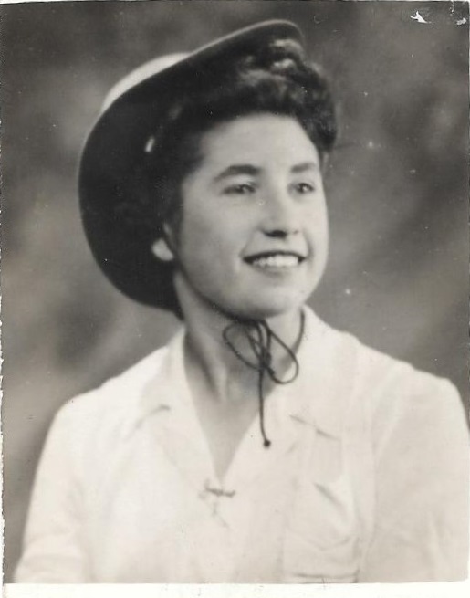 Image of sister Joan wearing a hat and smiling 