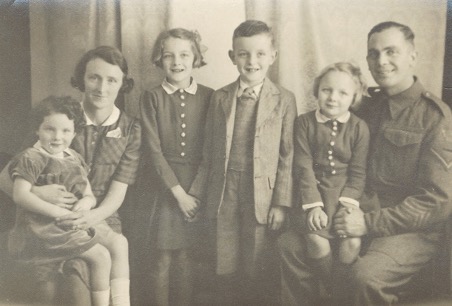 Robert with his family on leave prior to the Normandy invasion: Left to right Jean, our mother Elsie, Doreen, David and Beryl